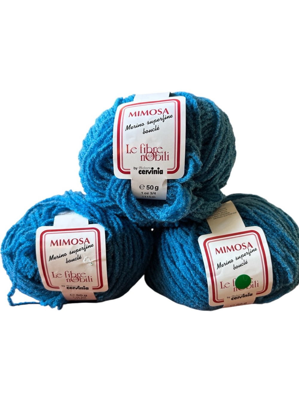 3 skeins of Mimosa Merino Superfine Bouclé by Lane Cervinia in Partita Teal Blue